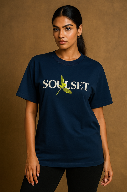 Close-up of navy blue SOULSET T-shirt featuring intricate dragonfly illustration and artistic typography on the back, nature-inspired graphic tee for modern fashion.
