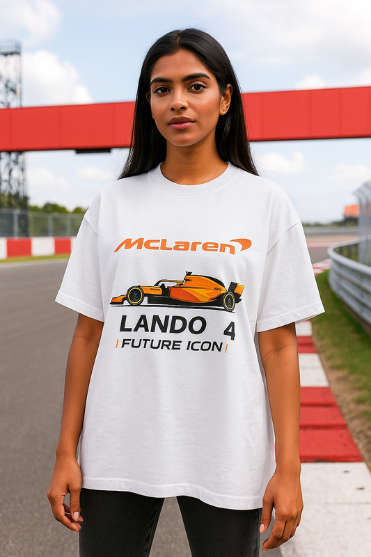Person wearing a white t-shirt with McLaren branding and a racing car graphic on a race track background.